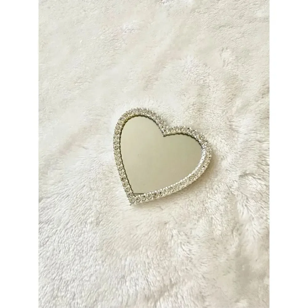 Silver with rhinestone embellished heart shaped phone mirror